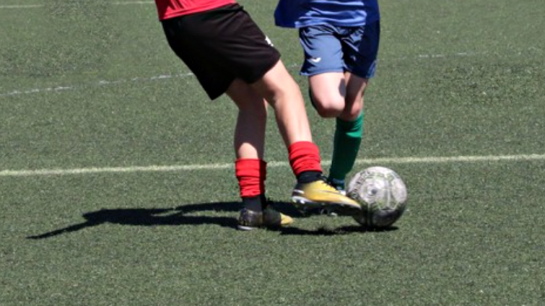 niños partido fútbol 7